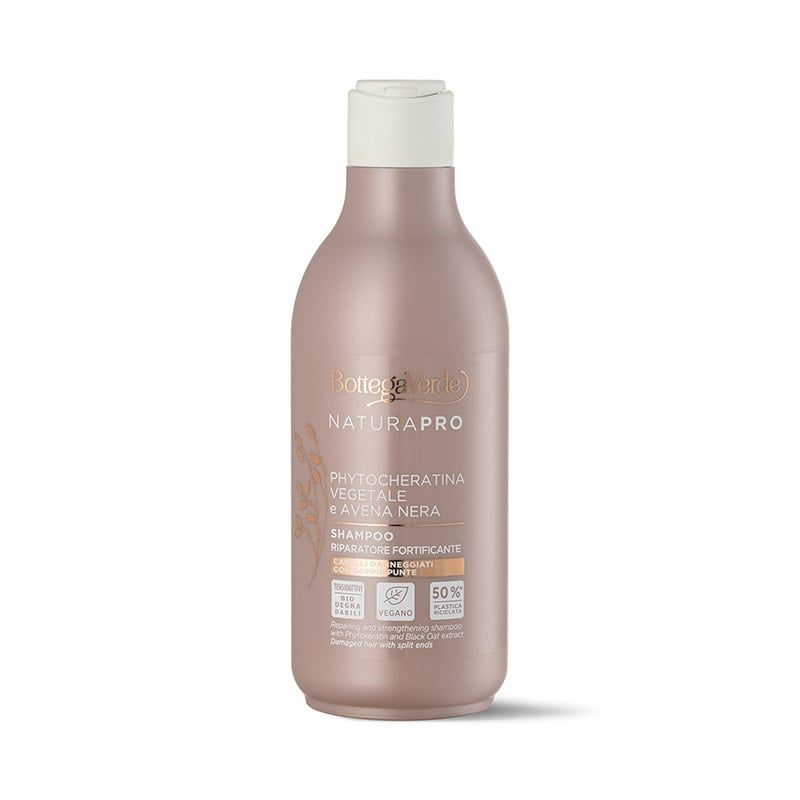 Flacone di shampoo beige rosato, tappo bianco. Scritta: Bottega Verde, Natura Pro, Phytocheratina vegetale e Avena nera.