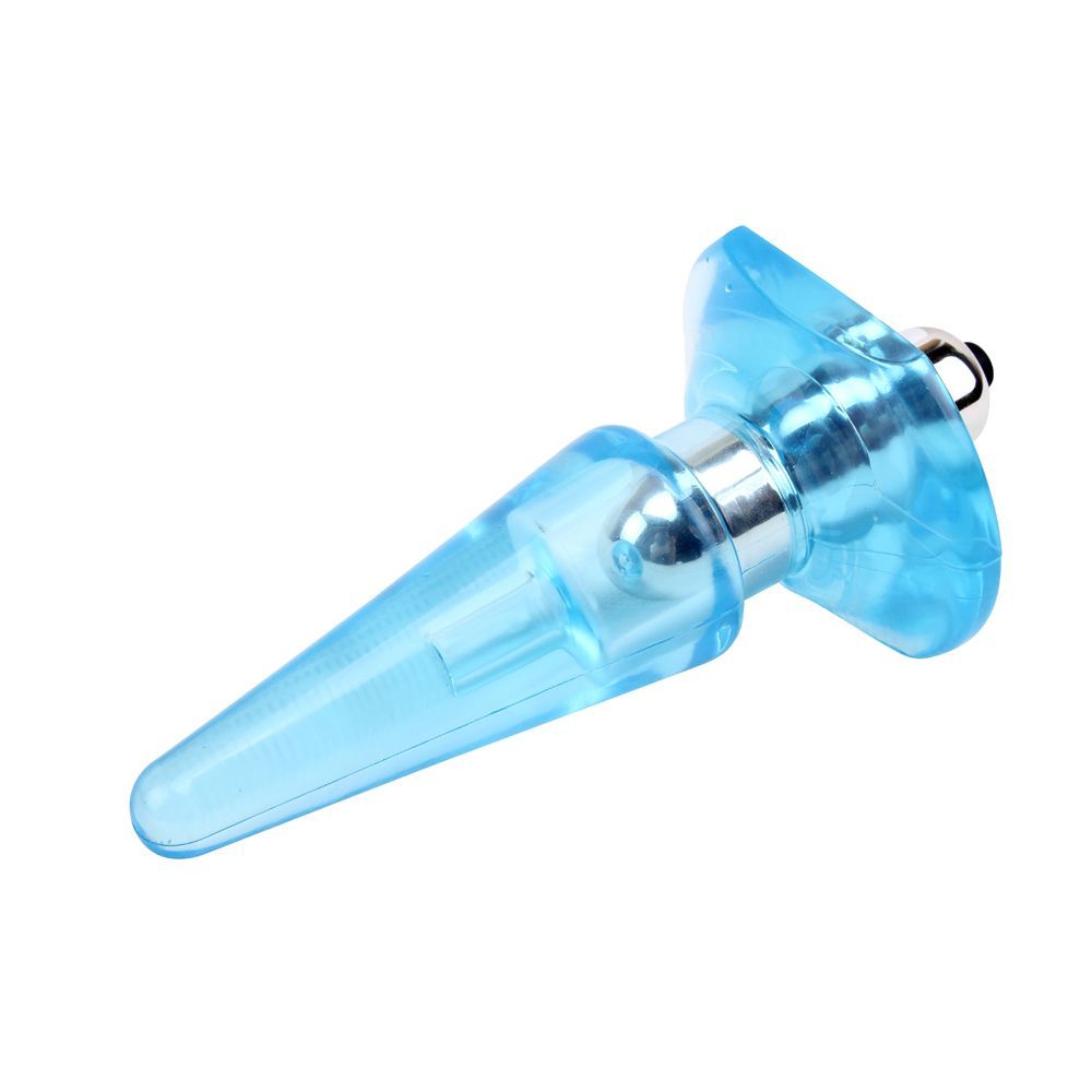 Plug anale blu, obliquo. Forma conica, base ampia. Anello metallico. Plastica trasparente.