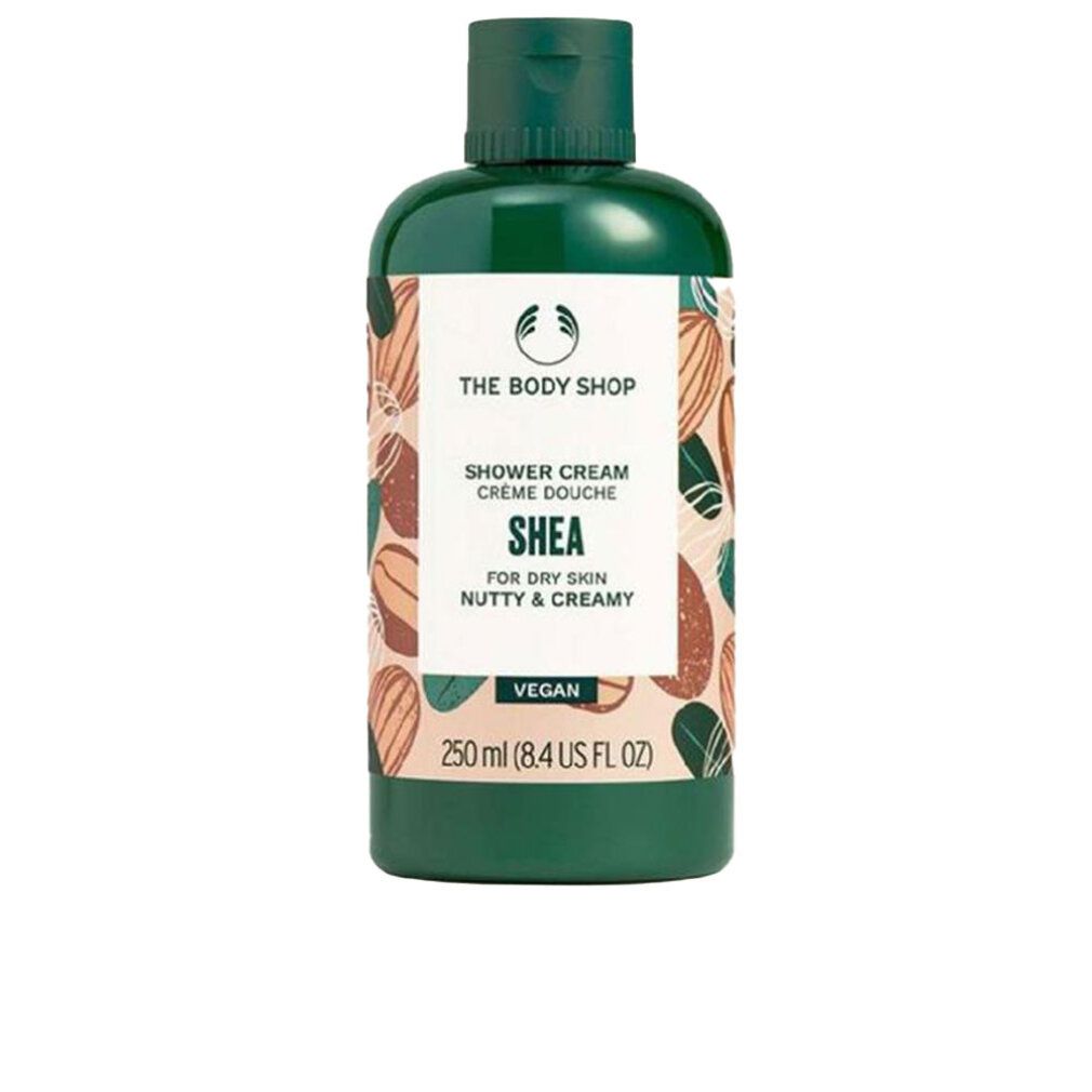 Flacone verde con tappo. Scritta: Shower Cream Shea, per pelli secche. Vegano. 250 ml.