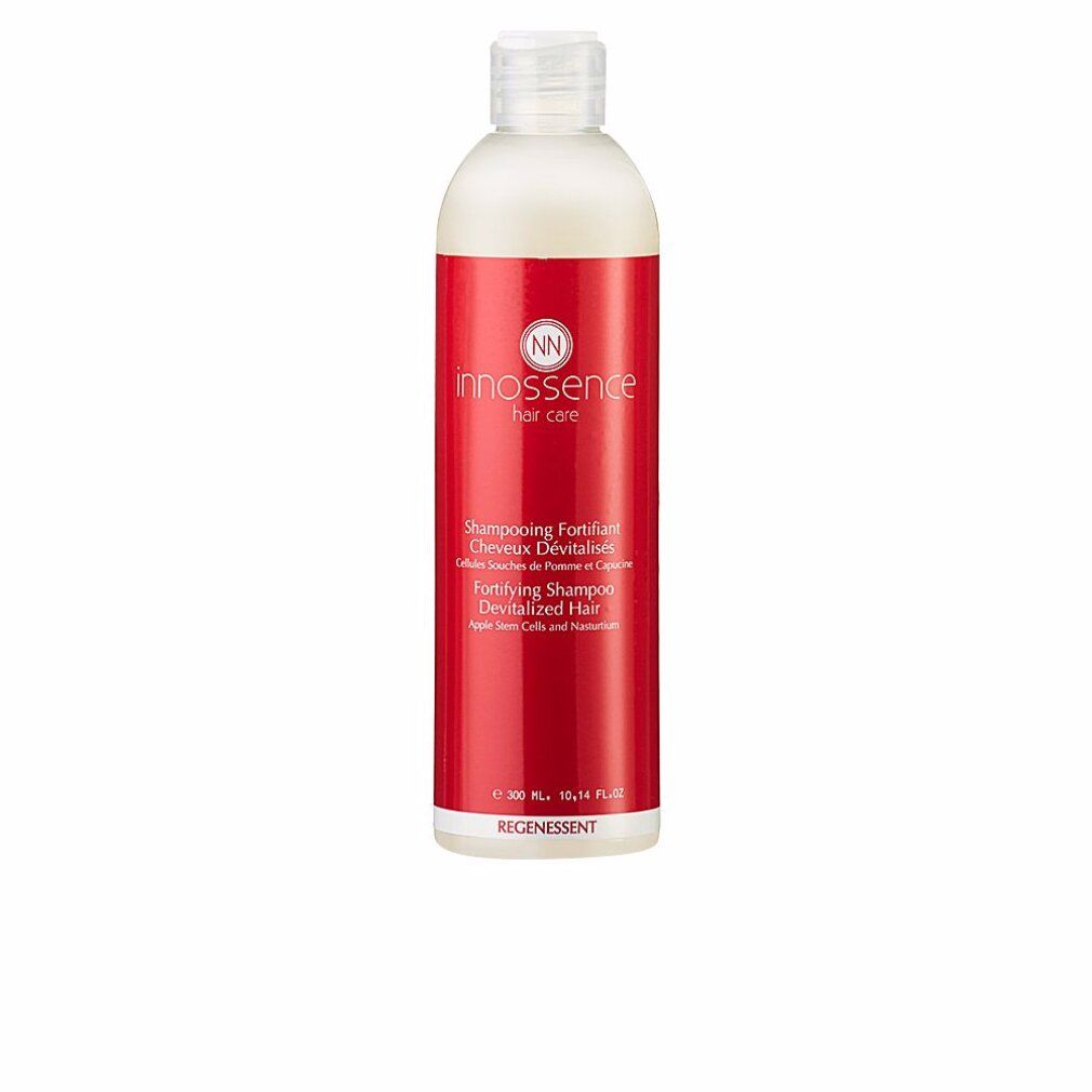 Flacone di shampoo con etichetta rossa. Scritta: Innossence Hair Care, Regenessent, Fortifying Shampoo. Tappo bianco.