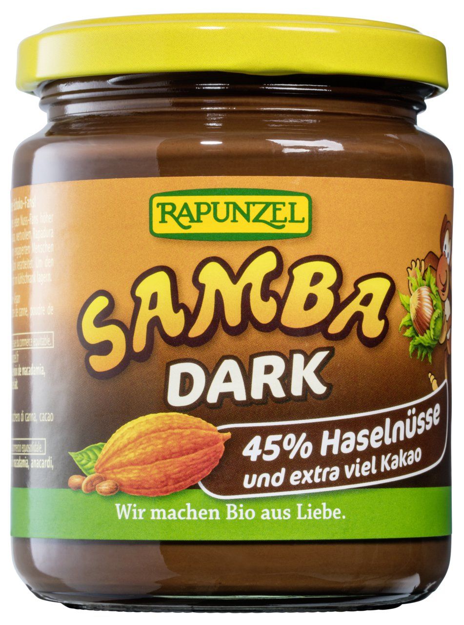 Crema spalmabile Rapunzel Samba Dark cacao-nocciole in vasetto con tappo giallo, nocciole e cacao.