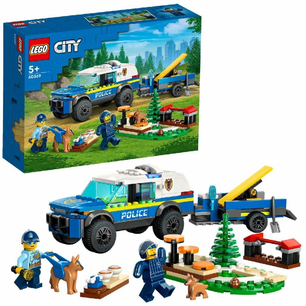 Set LEGO City. SUV della polizia, rimorchio, personaggi, cani, percorso addestramento. Confezione accanto al set.