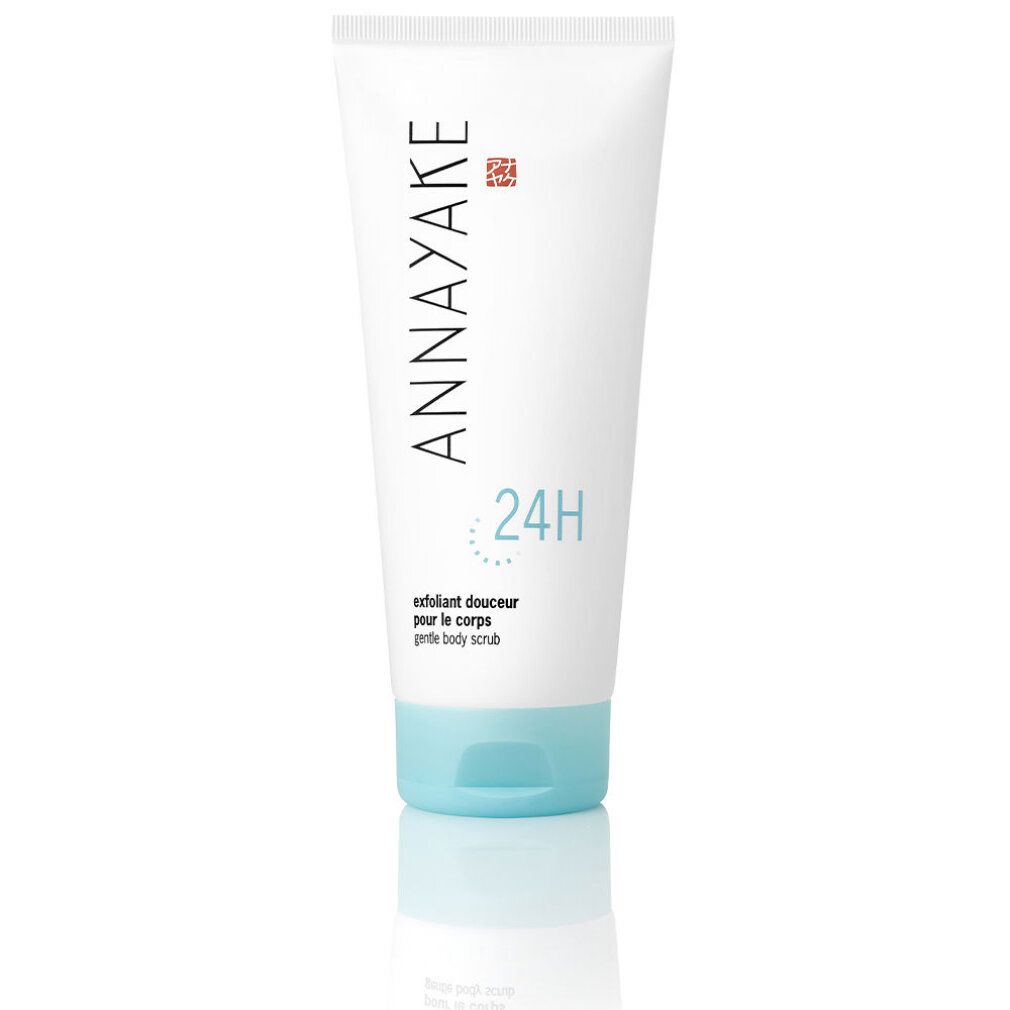 Tubo bianco con tappo blu. Scritta "ANNAYAKE" e "24H". Testo: "Exfoliant douceur pour le corps gentle body scrub".
