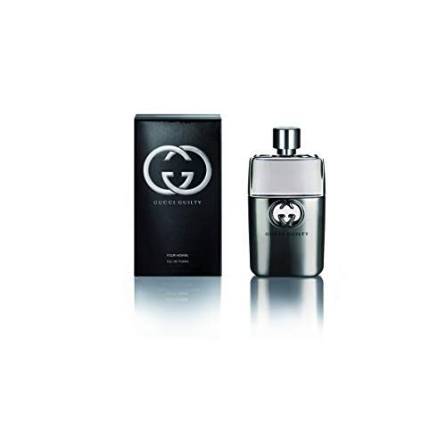 Flacone di Gucci Guilty Pour Homme Eau de Toilette Spray e confezione. Confezione nera con logo. Flacone argento con logo.