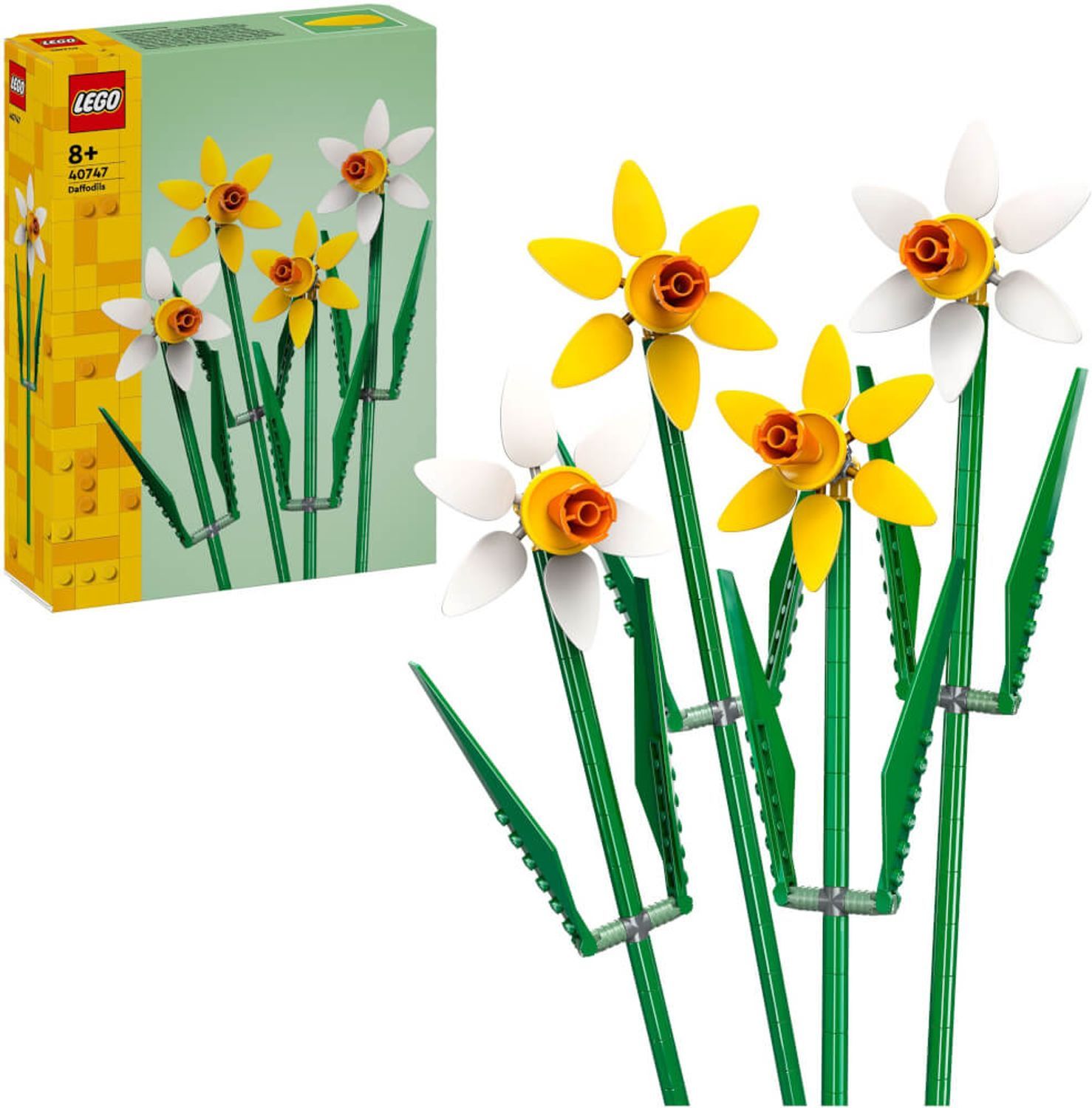 Set LEGO con fiori di narciso gialli e bianchi, steli e foglie verdi. Confezione con logo e raccomandazione di età.