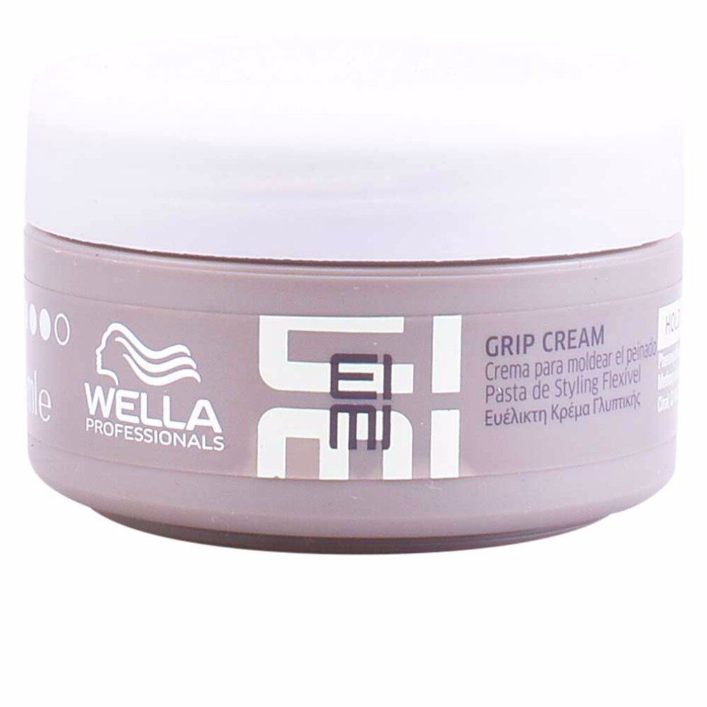 Barattolo di Wella Eimi Grip Cream. Barattolo grigio con coperchio bianco. Scritta Eimi e Grip Cream.