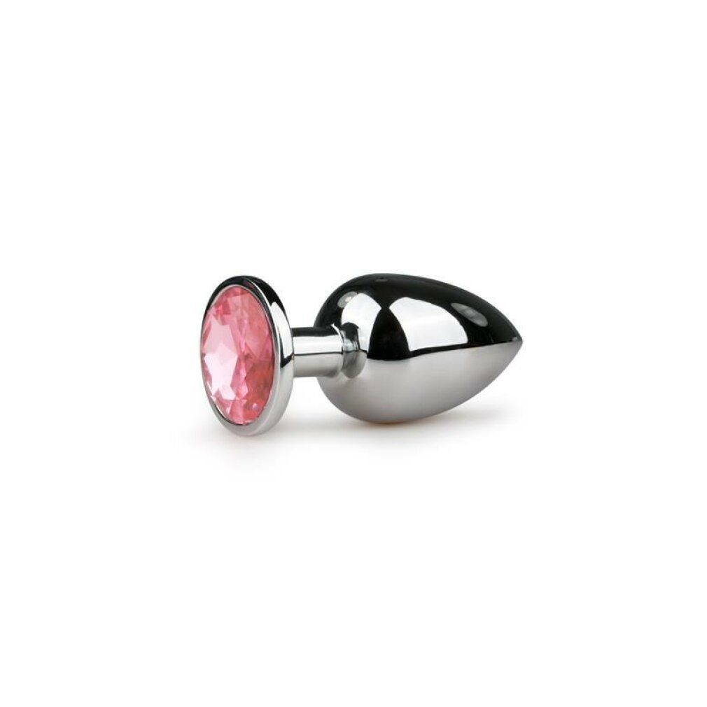Plug anale in metallo argentato con pietra rosa. Forma conica, estremità arrotondata. Pietra rosa rotonda.