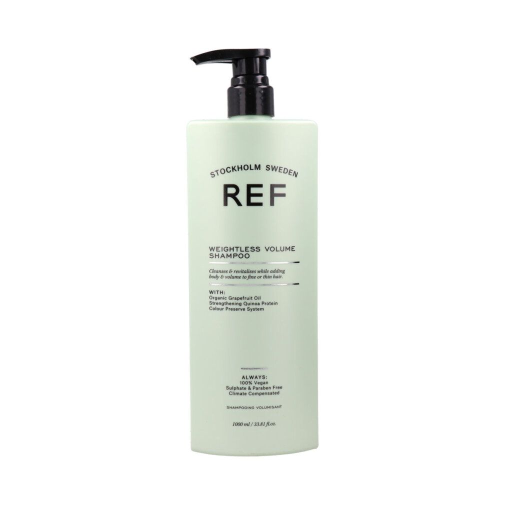 Flacone di shampoo verde con dosatore nero. Scritta: REF WEIGHTLESS VOLUME SHAMPOO. Testo: Organic Grapefruit Oil, Colour Preserve System.