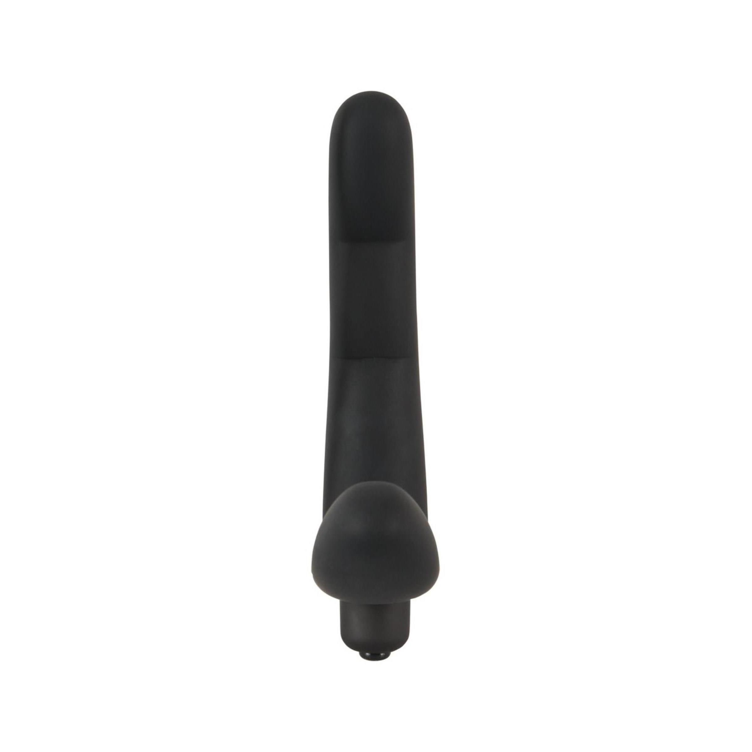 Vibratore nero di forma allungata. Composto da un'asta e un'estremità arrotondata. Base arrotondata.