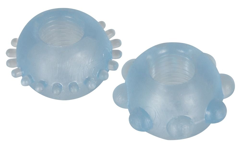Due anelli flessibili blu in silicone con bottoni e scanalature.
