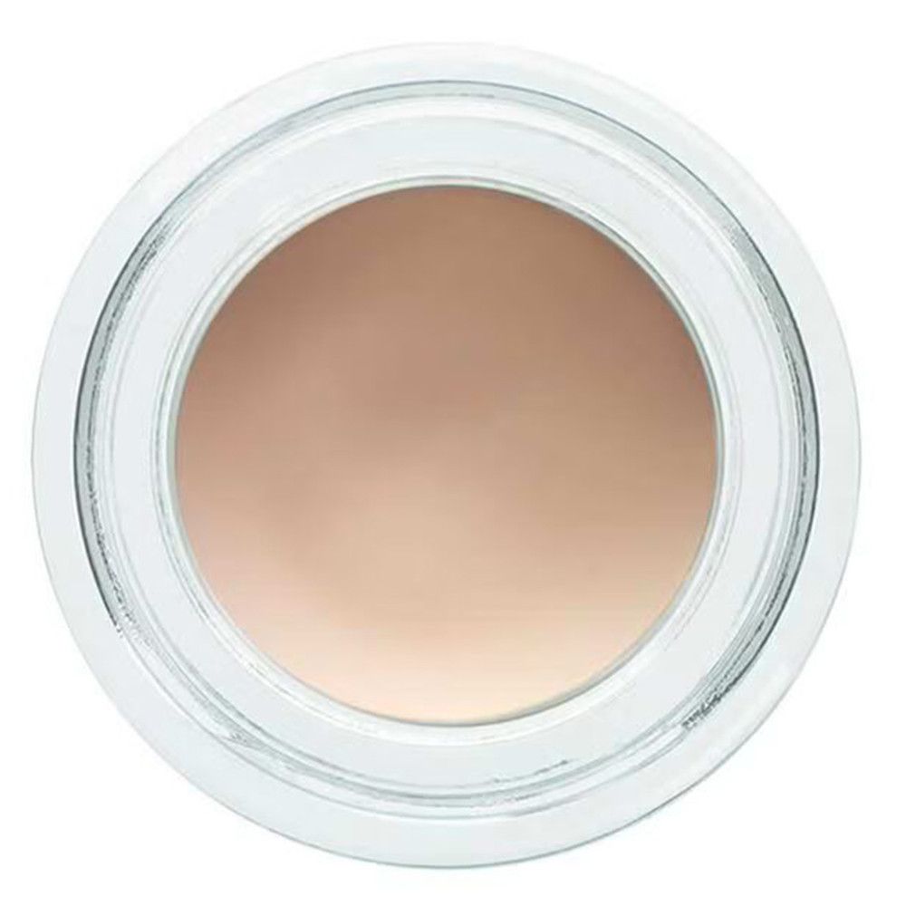 Vasetto rotondo trasparente con crema beige. Coperchio non visibile.