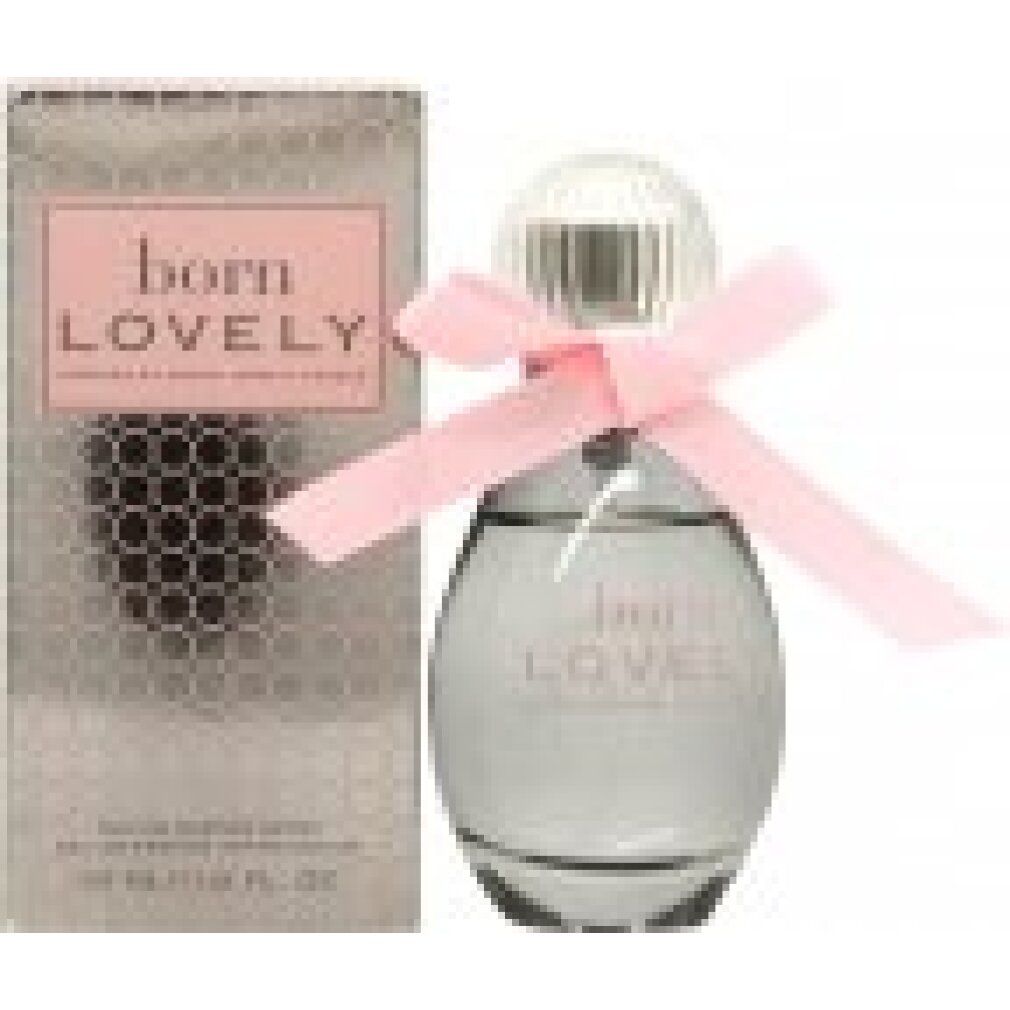 Flacone di profumo con fiocco rosa e confezione. Flacone con scritta "born LOVELY". Confezione con scritta "born LOVELY".