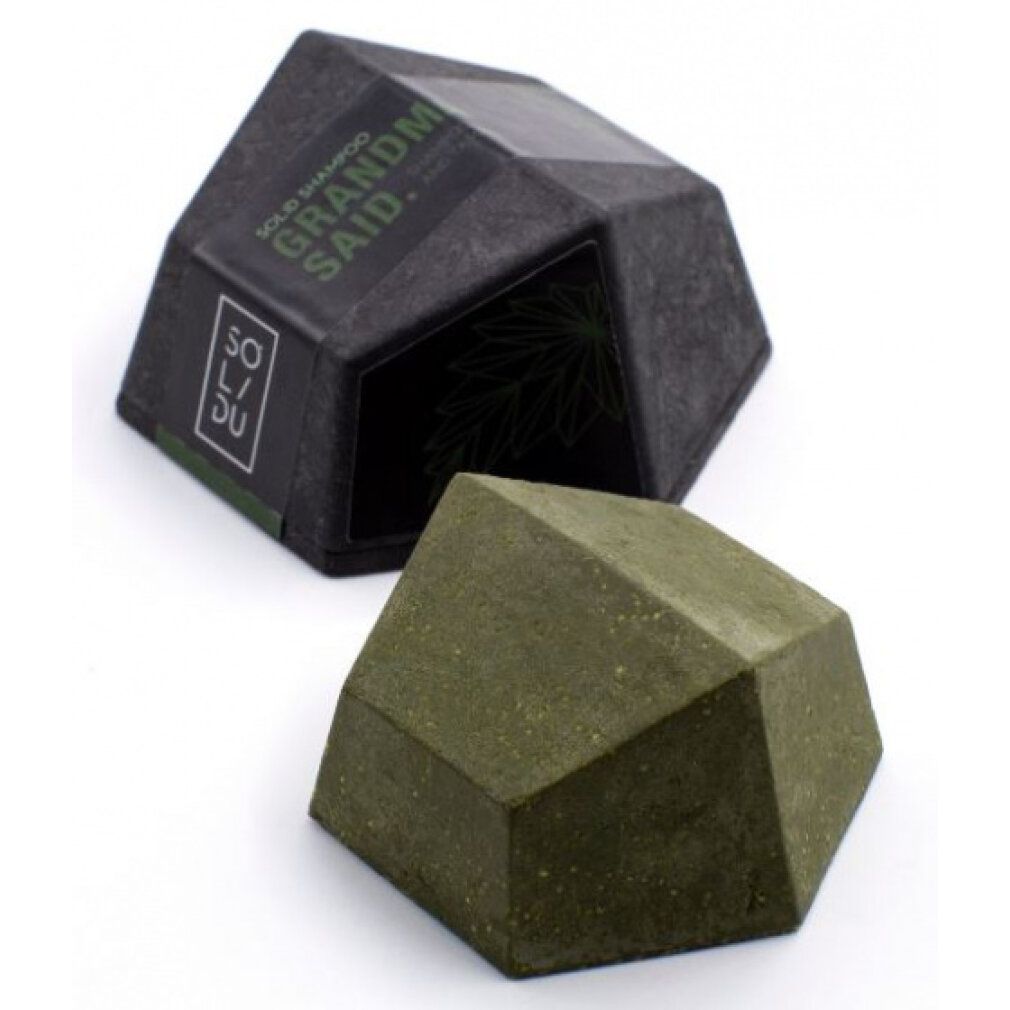 Barra shampoo verde geometrica e confezione nera. Scritta: SOLIDU, GRANDM SAID.