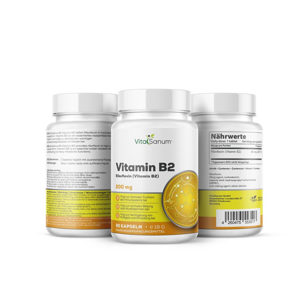 Tre flaconi bianchi con etichette. Scritta: VitaSanum Vitamina B2, 200 mg, 90 capsule. Elemento giallo.