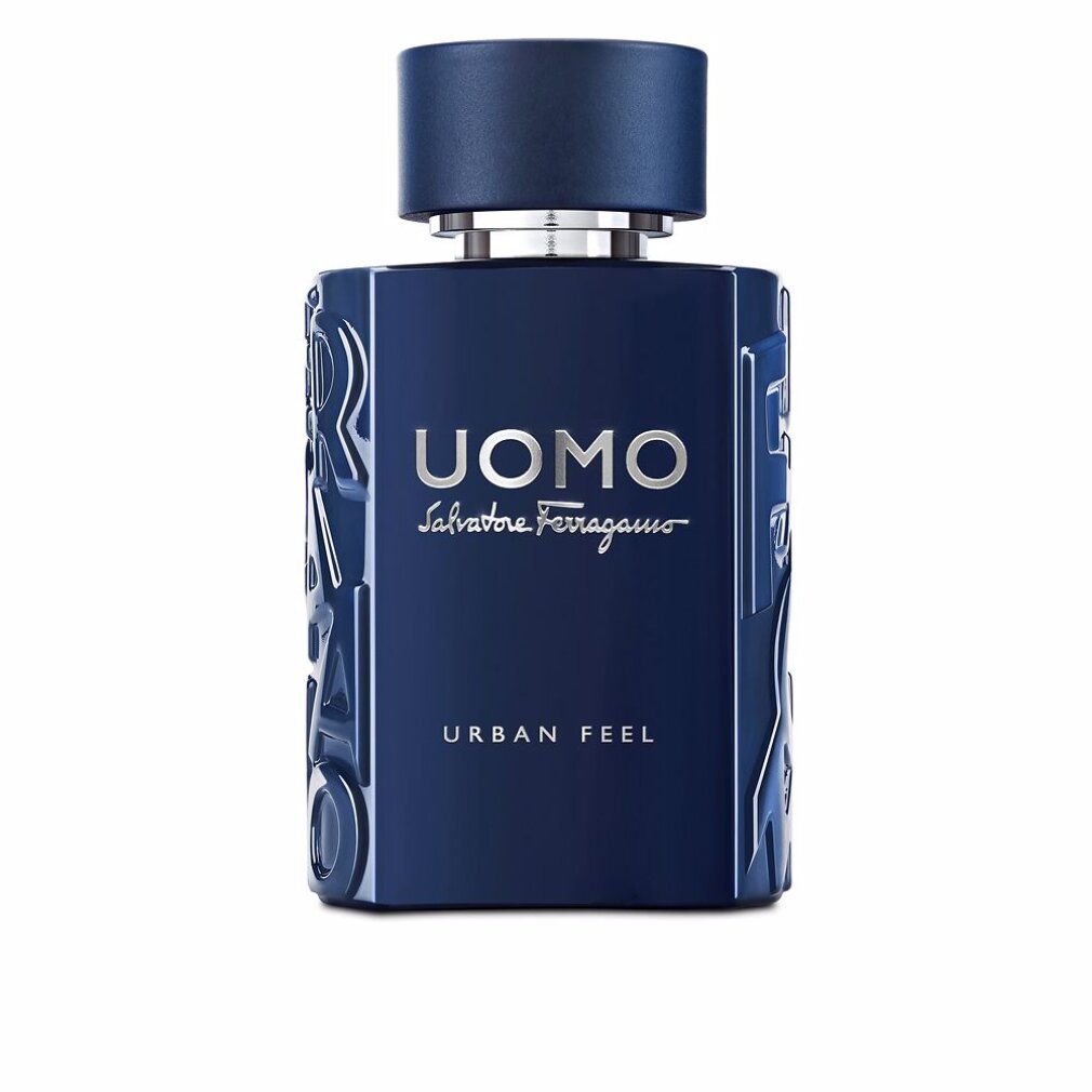 Flacone blu scuro con scritta argentata: UOMO Salvatore Ferragamo, Urban Feel. Tappo blu.