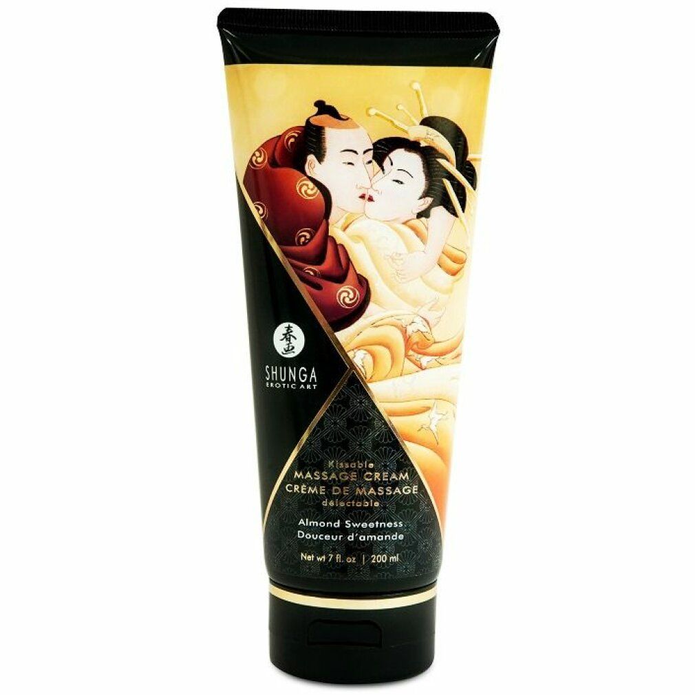 Tubo di crema per massaggio. Tappo nero, corpo dorato con illustrazione. Testo: SHUNGA, Massage Cream, Almond Sweetness.