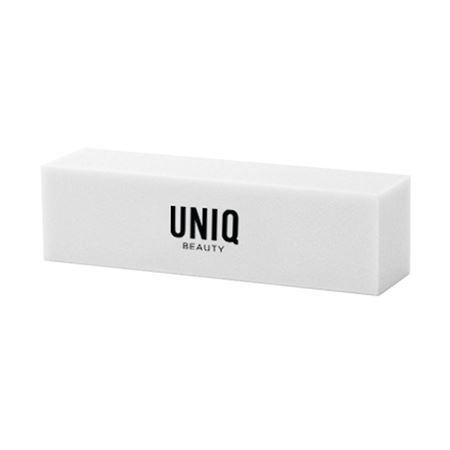 Blocco lucidante per unghie bianco con logo UNIQ BEAUTY nero.