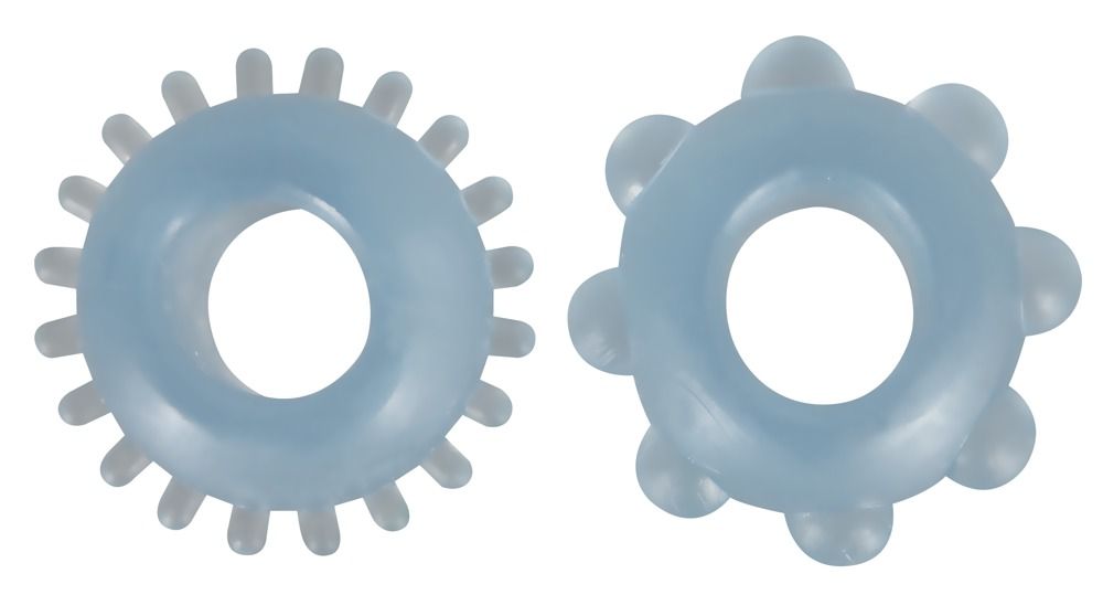 Due anelli per il pene blu. Un anello con punte, l'altro con nodi. Entrambi hanno un foro al centro. Materiale: TPE.