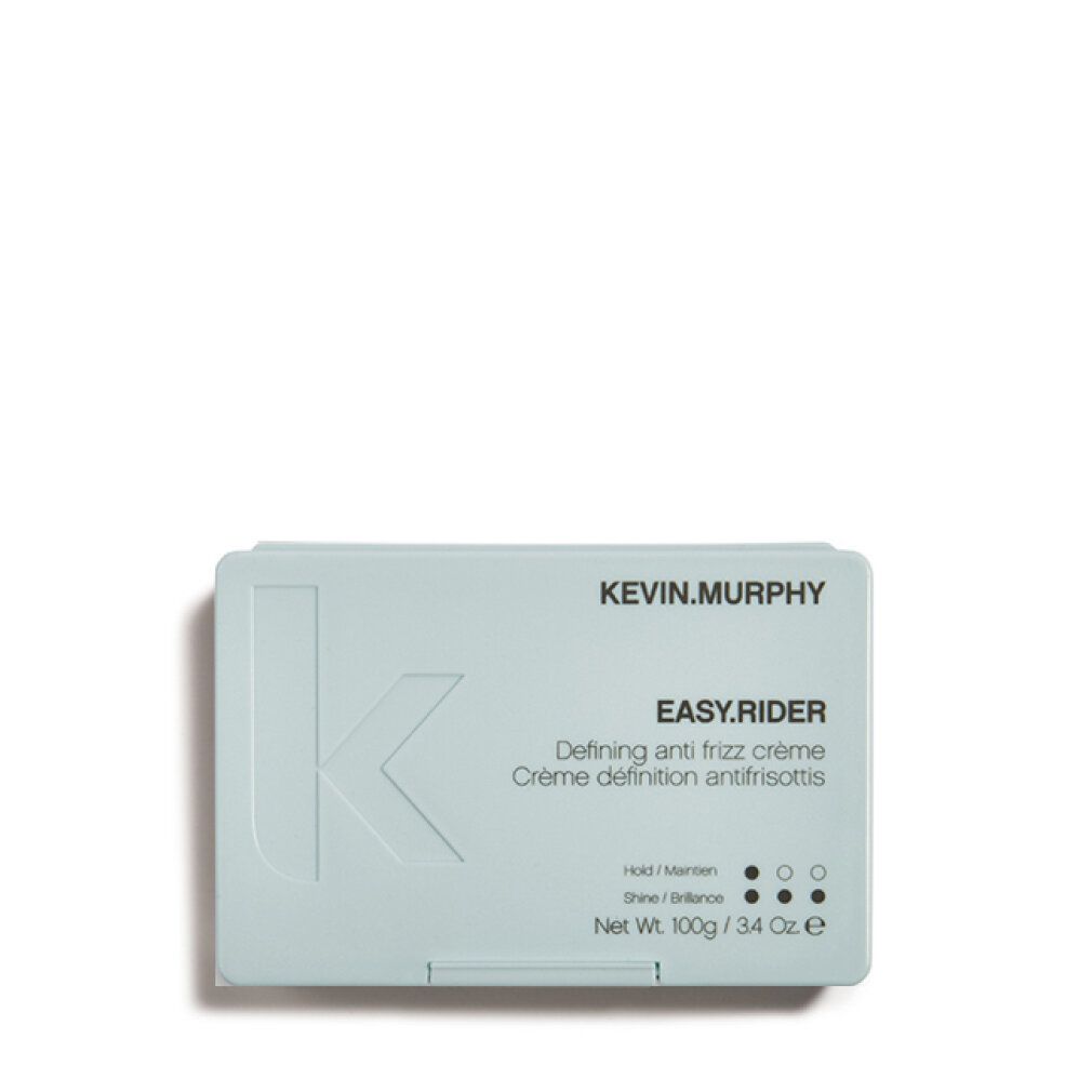 Prodotto azzurro rettangolare con coperchio ribaltabile. Scritta: KEVIN.MURPHY, EASY.RIDER, crema anti-crespo. Peso netto 100g / 3.4 Oz.
