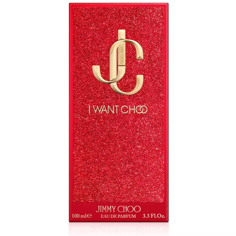 Confezione rettangolare rossa con logo e scritta dorati. Testo: I WANT CHOO, JIMMY CHOO, Eau de Parfum.