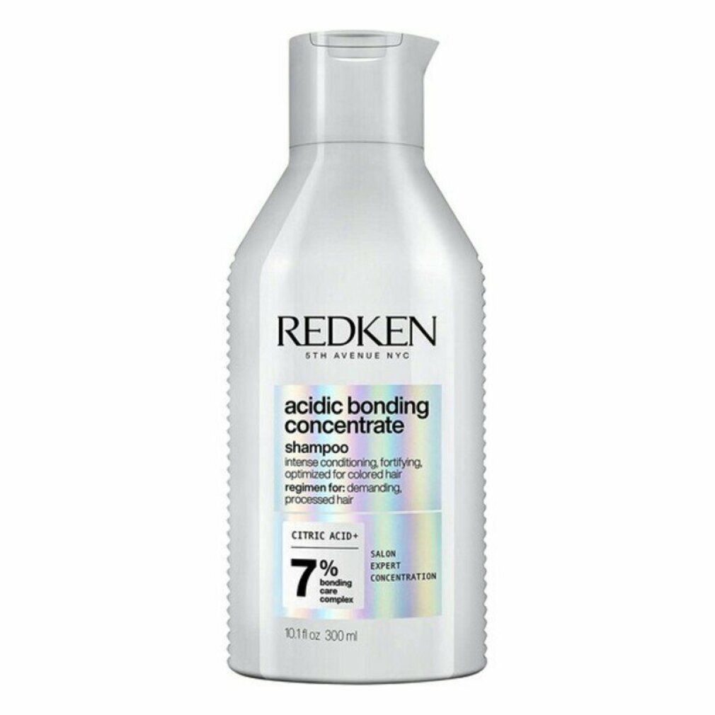 Flacone di shampoo bianco. Scritte: REDKEN, acidic bonding concentrate shampoo, 7% bonding care complex. 300 ml.