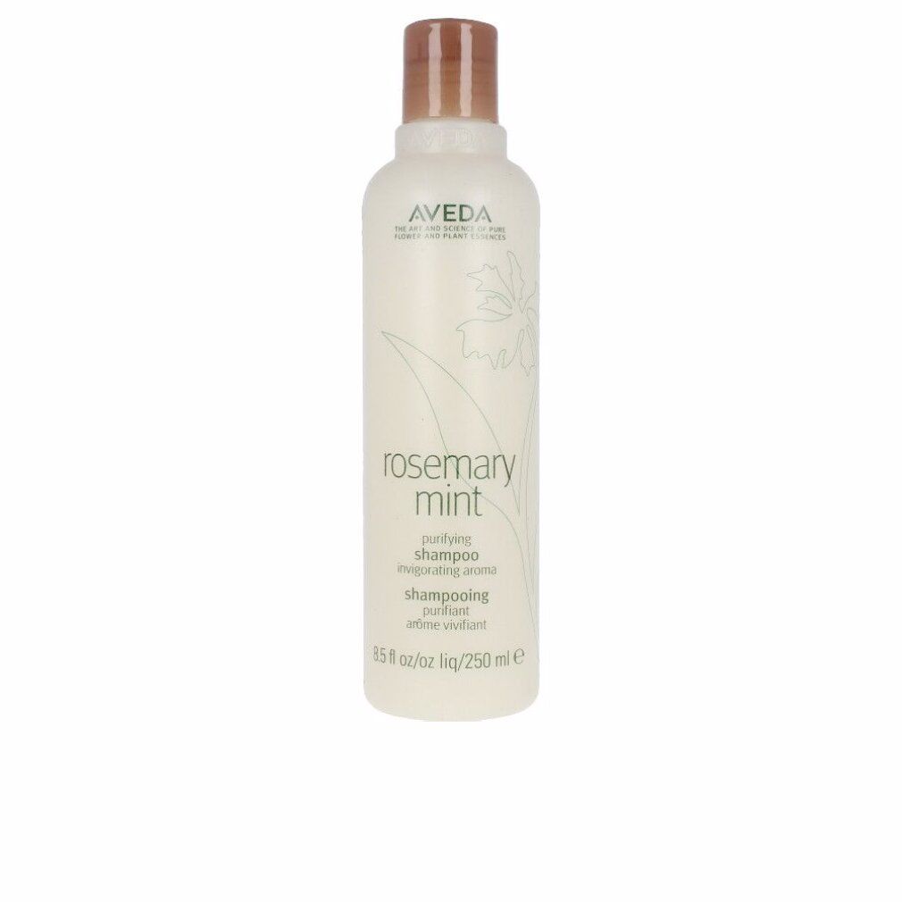 Flacone di shampoo Aveda. Etichetta bianca con testo e logo. Tappo marrone. Nome prodotto: Rosemary Mint.