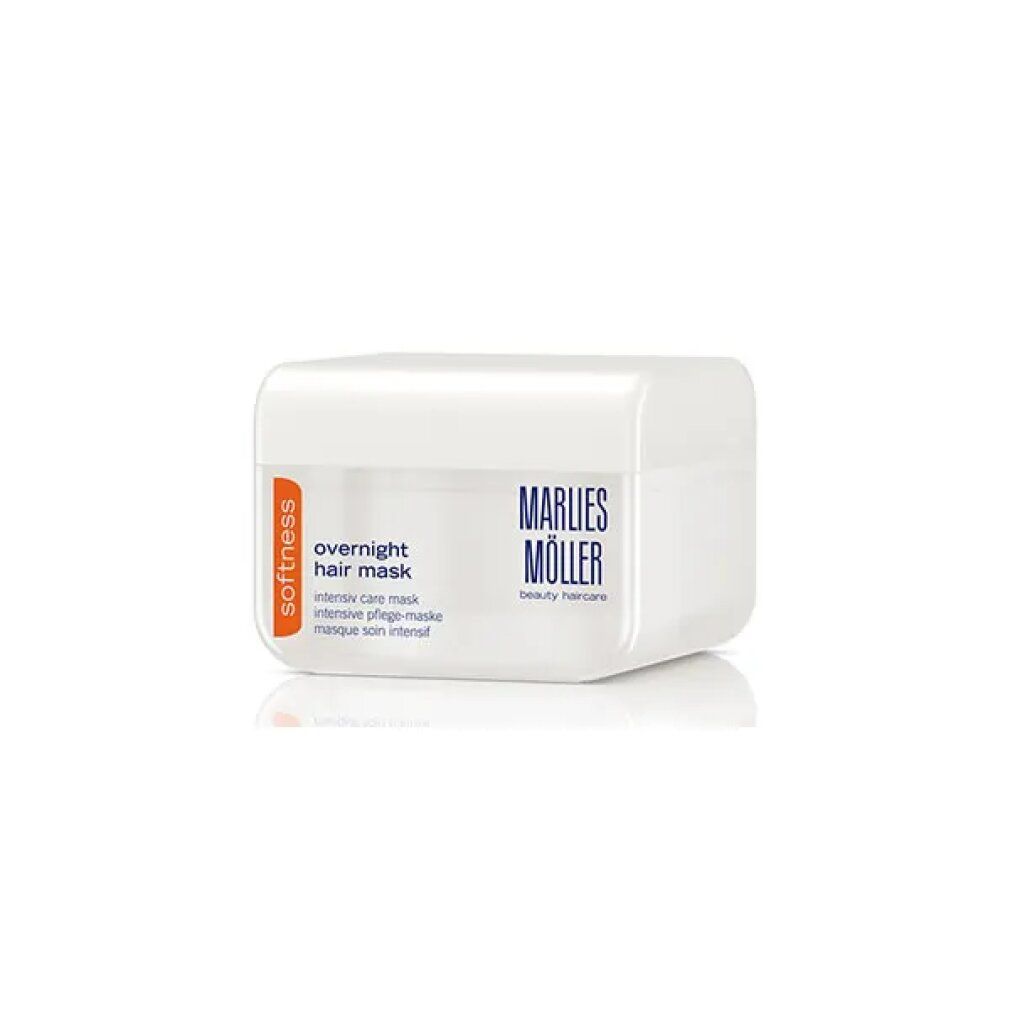 Vaso bianco con testo Marlies Möller. Striscia arancione con 'softness'. Testo: Overnight Hair Mask.