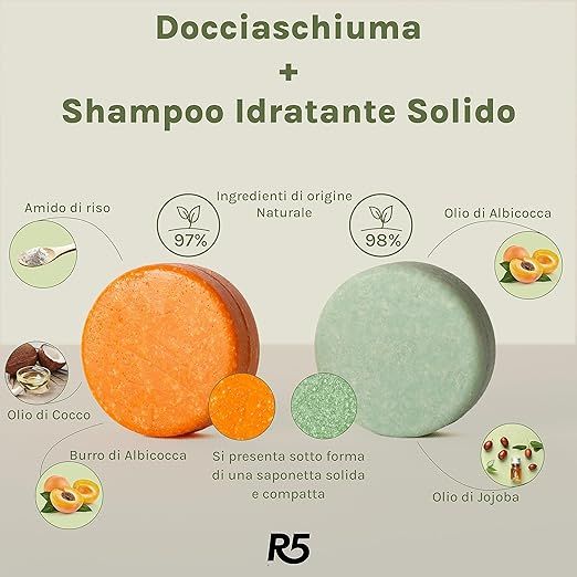 Due saponette rotonde, arancione e verde, con illustrazioni di ingredienti. Testo: « Docciaschiuma + Shampoo Idratante Solido » e « R5 ».