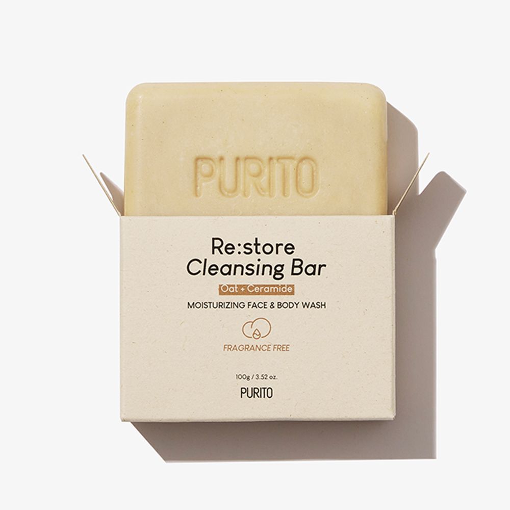 Sapone beige in confezione aperta. Sulla confezione: "Re:store Cleansing Bar" e "PURITO".