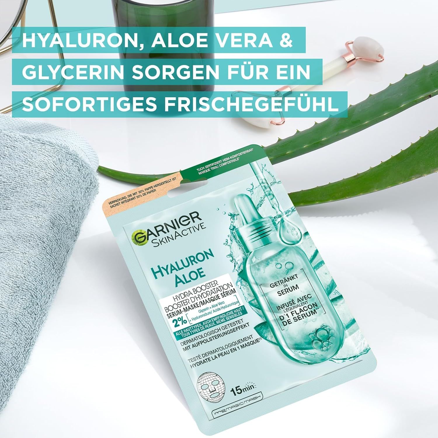 Garnier SkinActive Hyaluron Aloe Hydra Booster Serum-Maske. Confezione con foglia di aloe vera e accessori.
