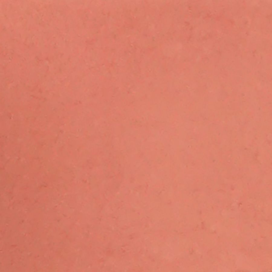 Ricarica blush stick rosa salmone. Superficie opaca e uniforme.