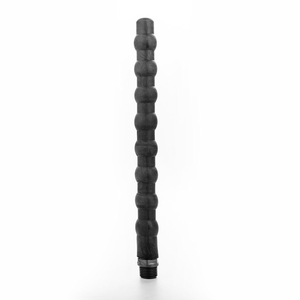Ugello per doccia anale in silicone nero. Forma allungata con superficie scanalata. Attacco filettato in basso. Materiale flessibile.
