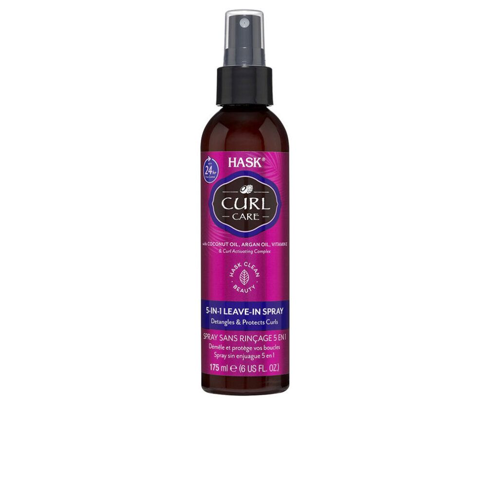 Flacone spray marrone con erogatore nero. Etichetta con nome e testo del prodotto. Sfondo rosa.