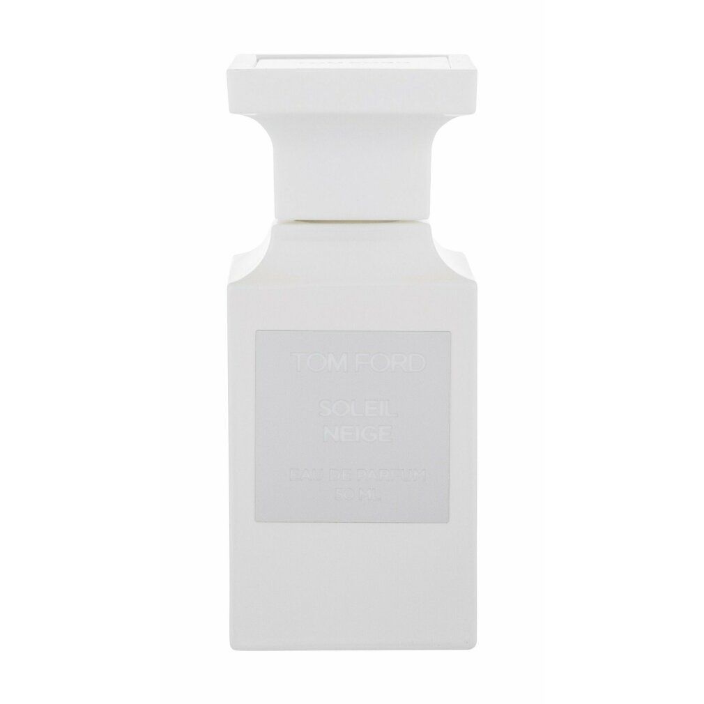 Flacone di profumo bianco. Forma rettangolare con tappo bianco. Etichetta nera con nome del prodotto.