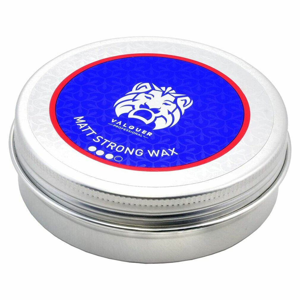 Barattolo rotondo argentato con coperchio blu. Scritta "MATT STRONG WAX" e logo. Anello rosso e blu attorno al logo.