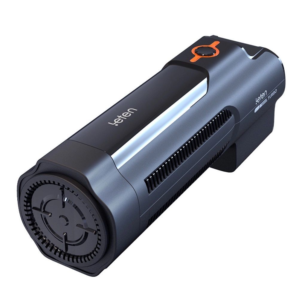 Dispositivo cilindrico nero con dettagli arancioni. Scritta "leten". Fessure di ventilazione laterali ed estremità circolare.