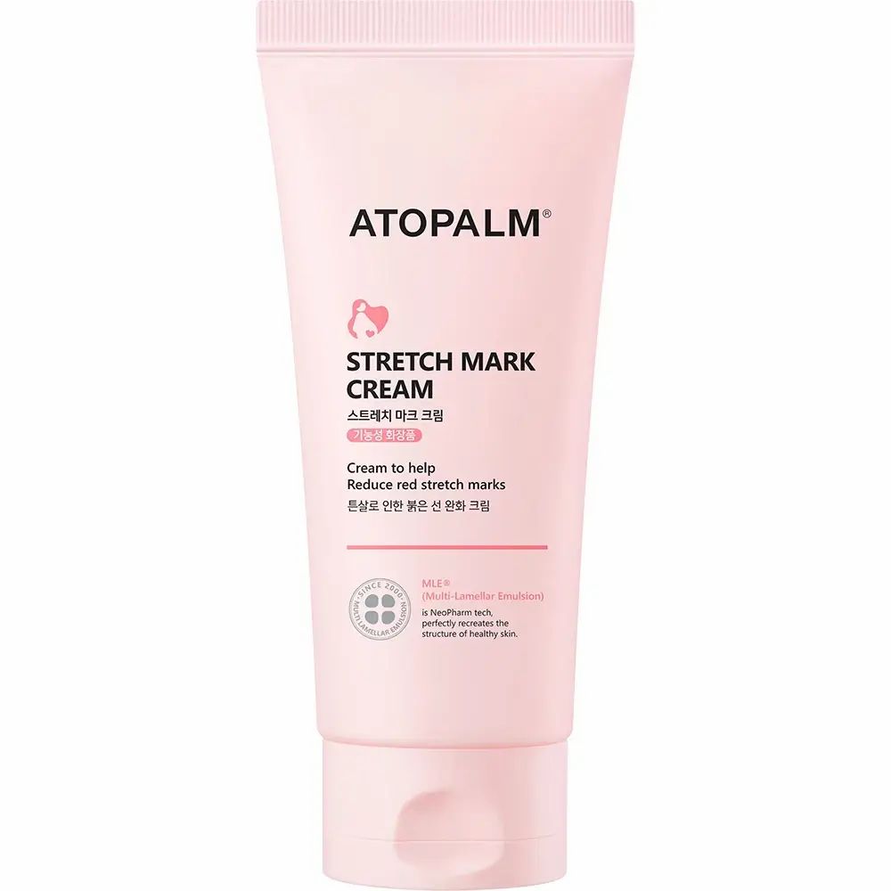Tubo rosa con testo bianco. Nome prodotto: STRETCH MARK CREAM. Logo e testo multilingue.
