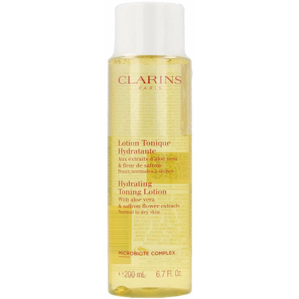Clarins Lotion Tonique Hydratante. Liquido giallo in bottiglia con tappo bianco. Testo sull'etichetta.