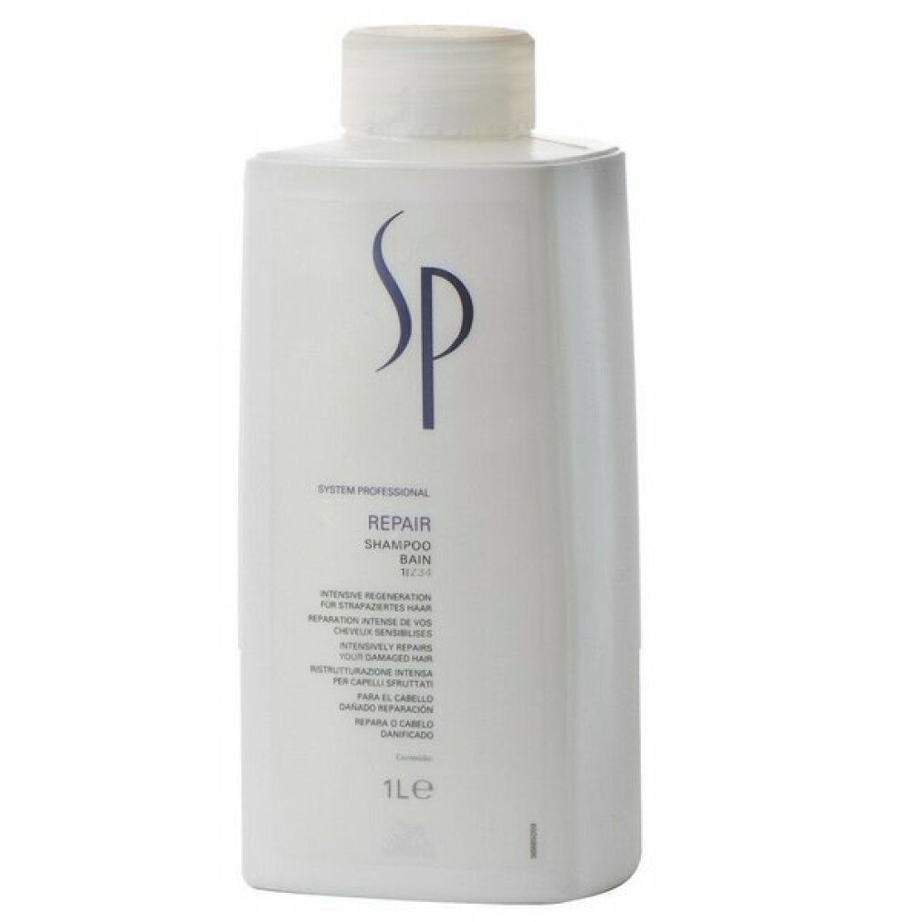 Flacone di shampoo bianco con logo SP blu. Testo: Repair Shampoo, 1L. Flacone con tappo bianco.