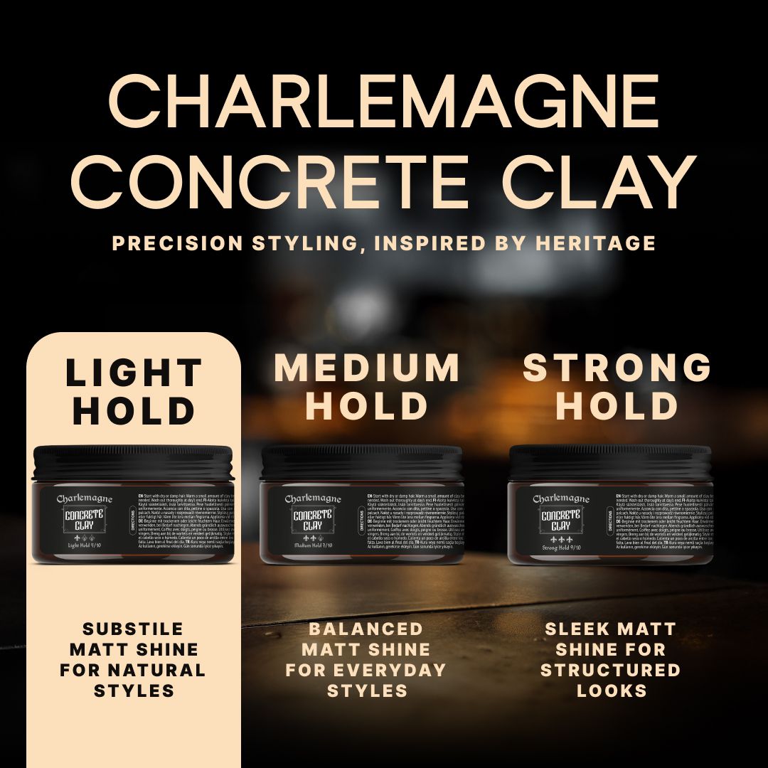 Tre lattine nere con etichette che mostrano 'Matte Pomade' e 'Charles Magn&'.