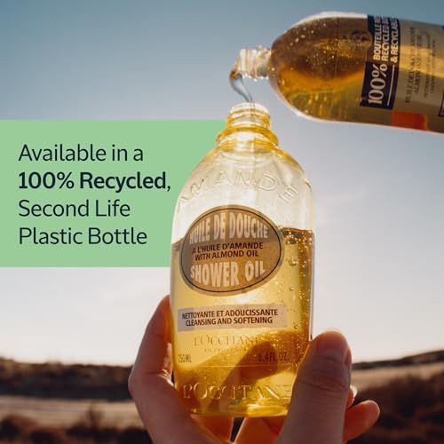 Flacone giallo con pompa. Scritta: Huile de Douche, Shower Oil, L'Occitane. Testo: 100% riciclato.