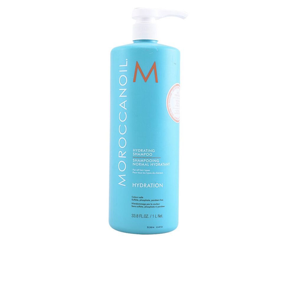 Flacone turchese con dosatore bianco. Scritta: Moroccanoil, Hydrating Shampoo. Logo arancione.