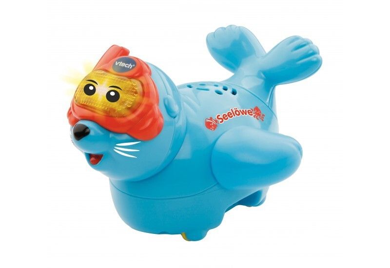 Foca blu con maschera da sub rossa. Scritta "Seelöwe". Marchio VTech. Giocattolo per bambini.