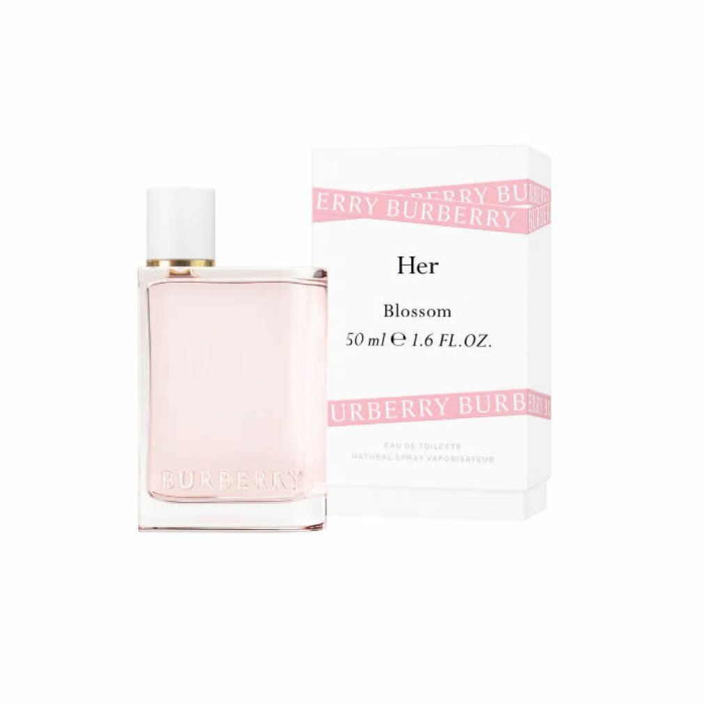 Flacone di profumo e confezione. Flacone con tappo bianco, liquido rosa. Confezione con testo: Burberry Her Blossom.