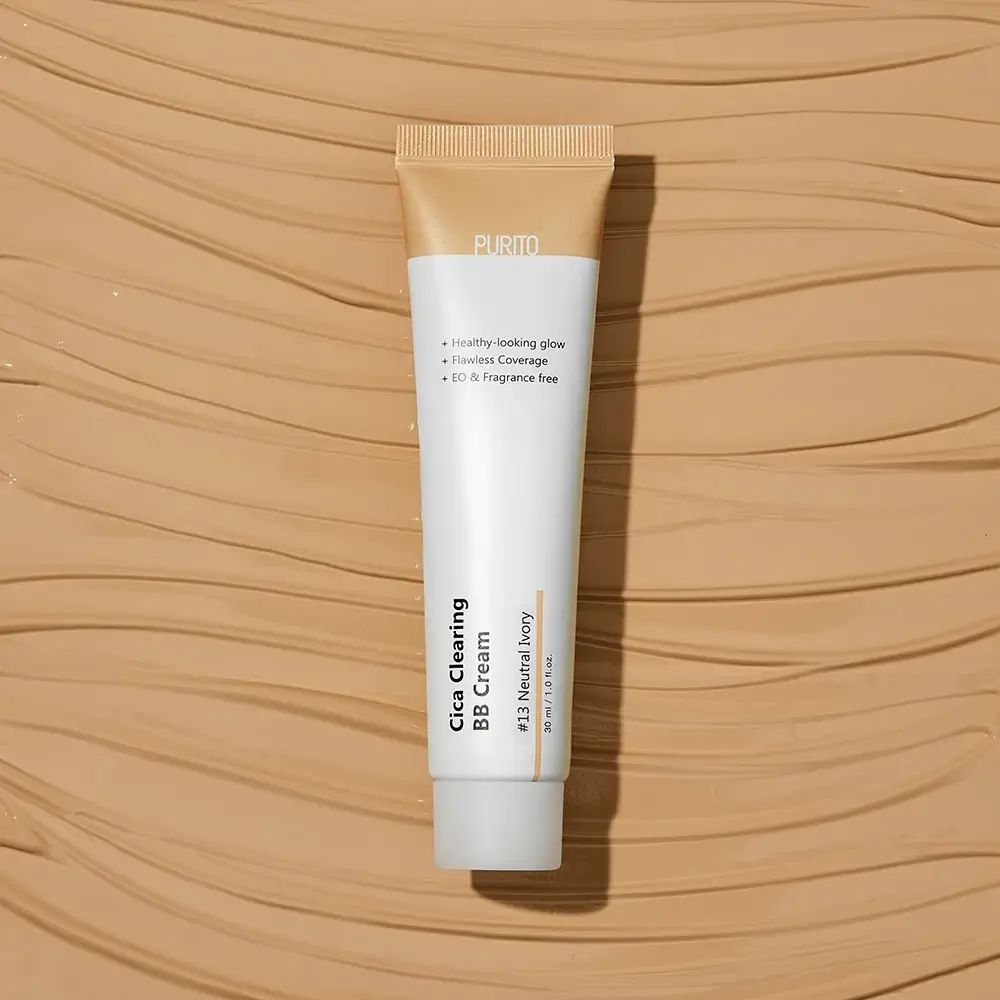 Tubo di crema con testo su sfondo beige. Contiene BB Cream. Tonalità #13 Neutral Ivory.