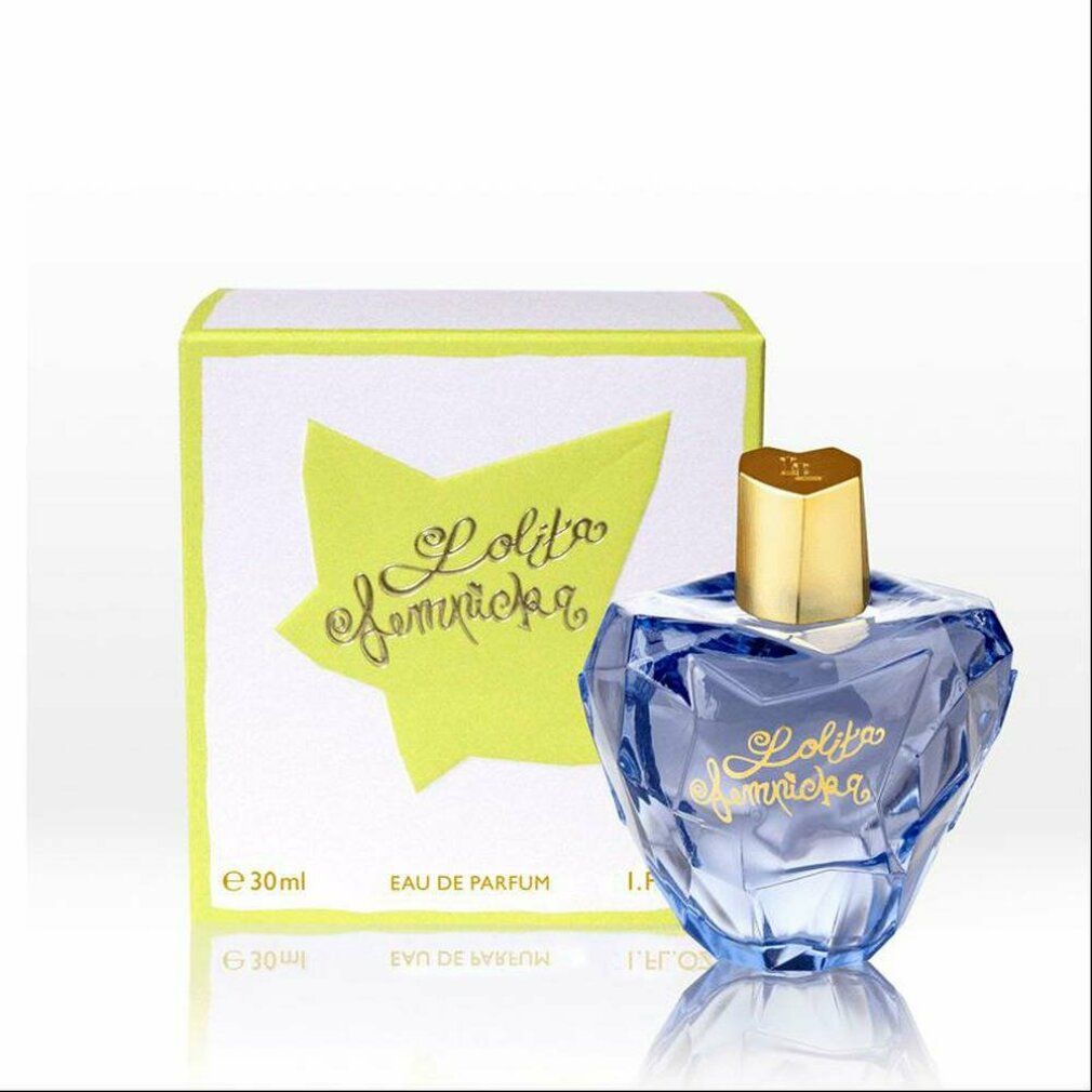 Flacone e confezione. Flacone blu, tappo dorato, scritta dorata "Lolita Lempicka". Confezione giallo-bianca.