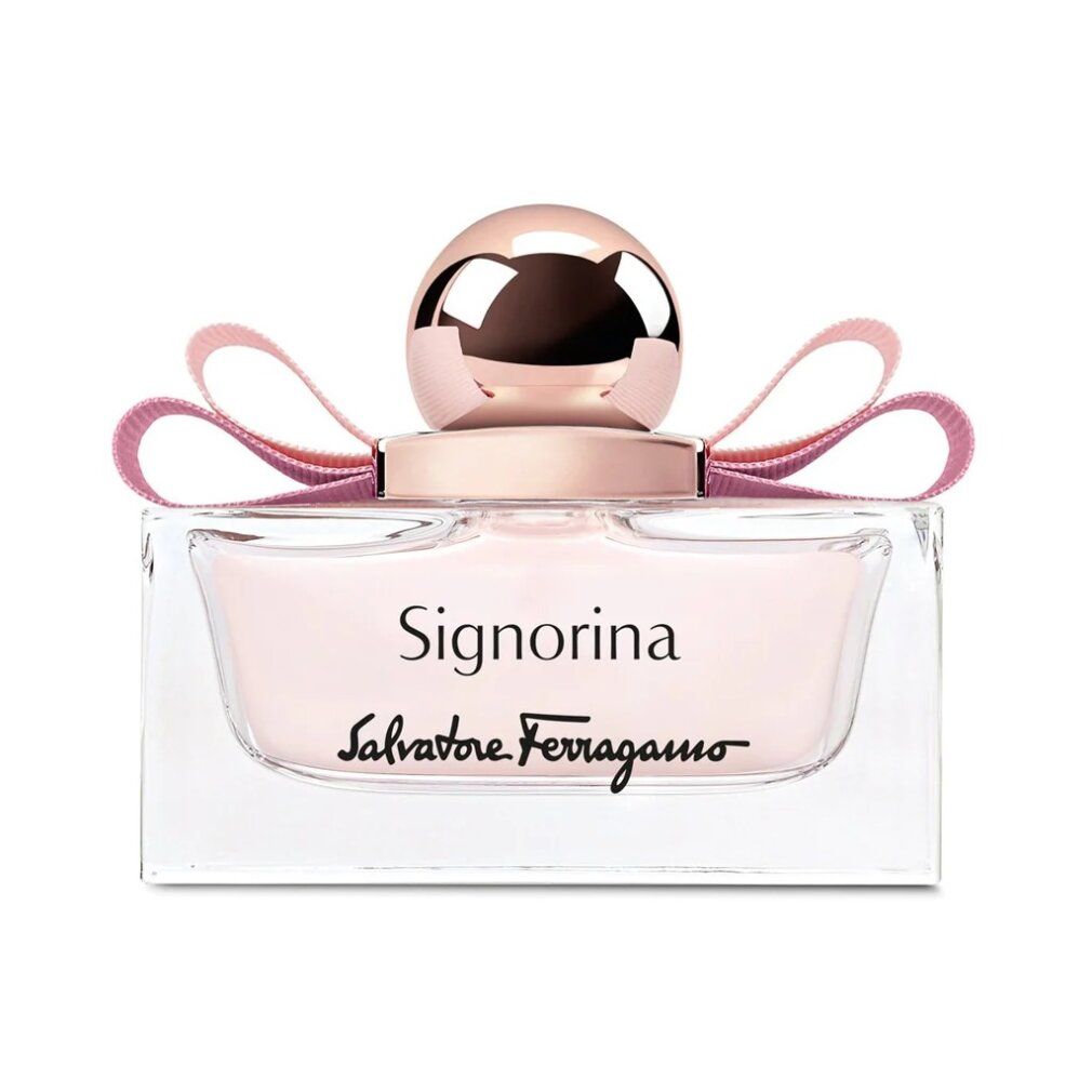 Flacone di profumo Signorina Eau de Parfum. Flacone rettangolare in vetro con liquido rosa. Fiocco rosa e tappo dorato.