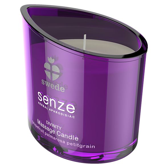 Candela viola con stoppino e coperchio nero. Scritta: swede, senze, Divinity Massage Candle, Grapefruit Palmarosa Petitgrain.
