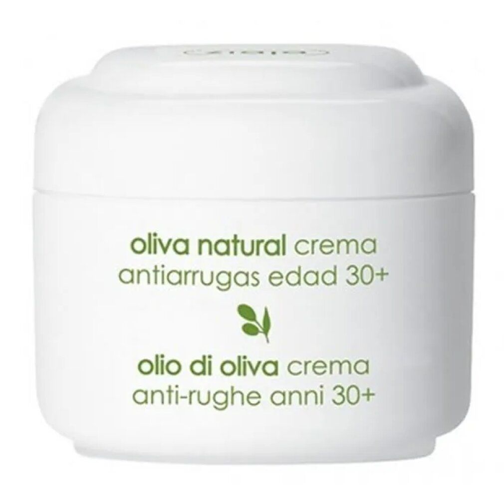 Vasetto bianco con testo verde: oliva natural crema antiarrugas edad 30+, olio di oliva crema anti-rughe anni 30+. Logo vegan.