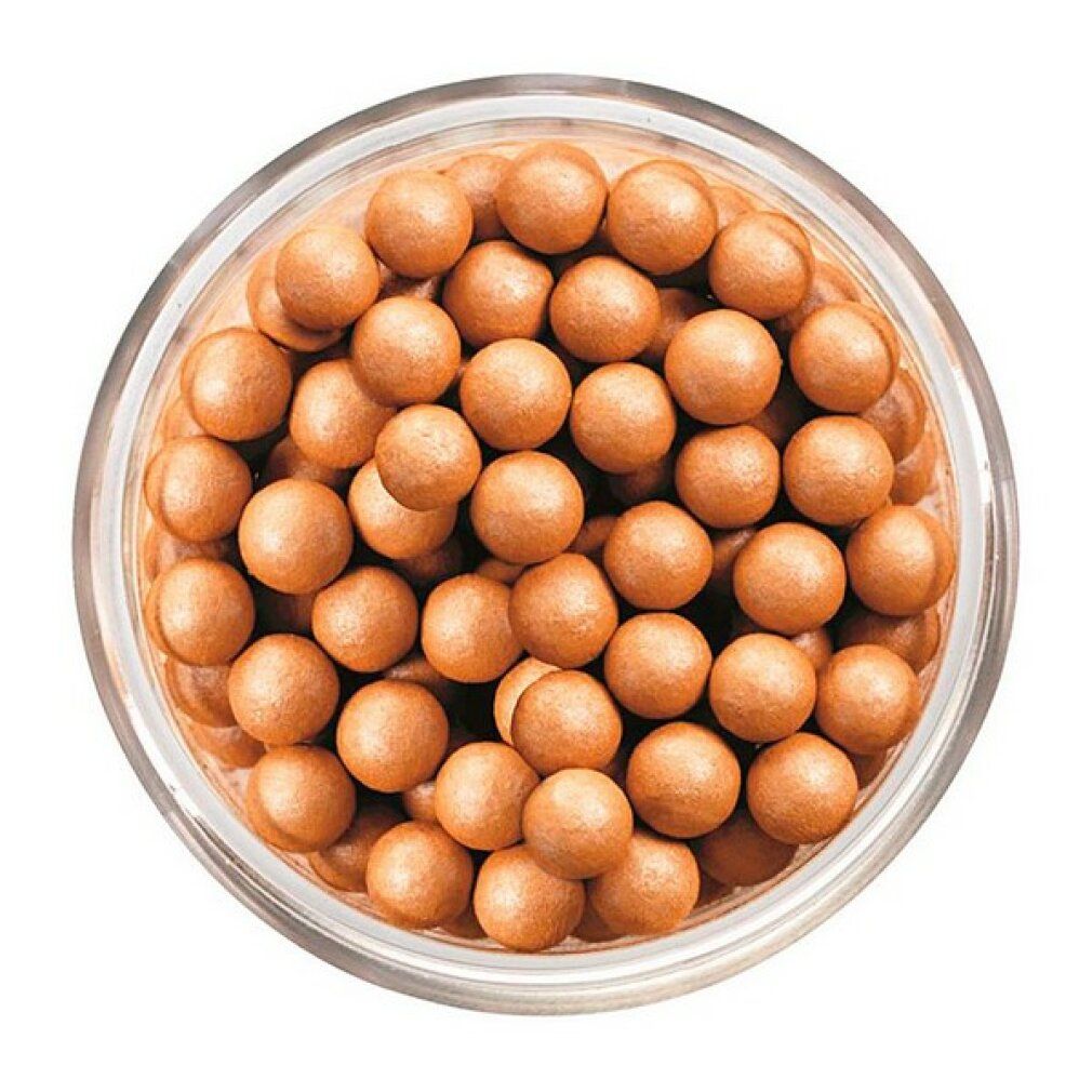 Sferette dorate in un contenitore di vetro trasparente. Vista dall'alto.